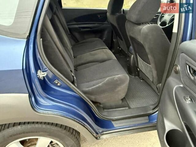 Синий Хендай Туксон, объемом двигателя 2 л и пробегом 270 тыс. км за 6250 $, фото 13 на Automoto.ua
