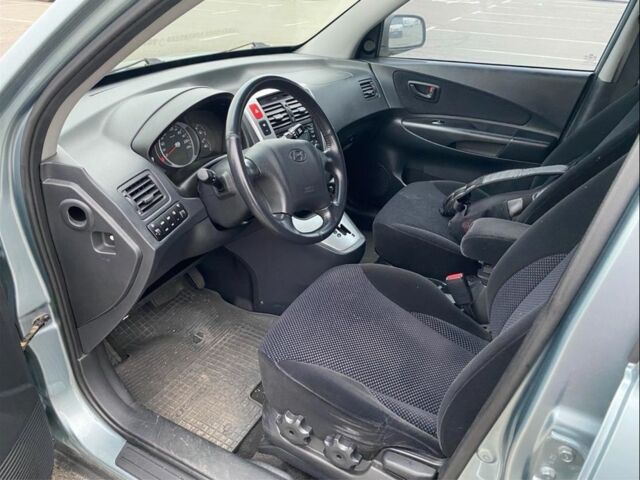 Синий Хендай Туксон, объемом двигателя 2 л и пробегом 179 тыс. км за 6500 $, фото 6 на Automoto.ua