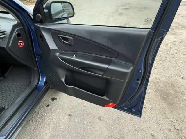 Синий Хендай Туксон, объемом двигателя 2 л и пробегом 279 тыс. км за 6280 $, фото 14 на Automoto.ua