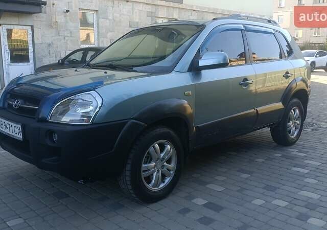 Синий Хендай Туксон, объемом двигателя 1.98 л и пробегом 183 тыс. км за 6700 $, фото 8 на Automoto.ua