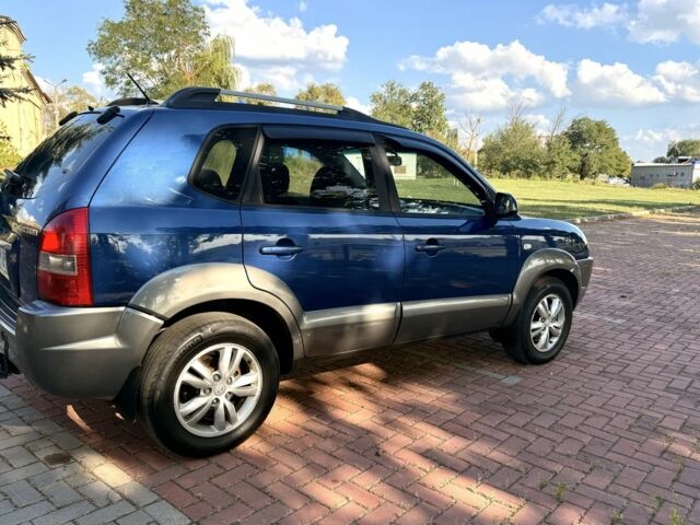 Синий Хендай Туксон, объемом двигателя 2 л и пробегом 168 тыс. км за 7500 $, фото 1 на Automoto.ua