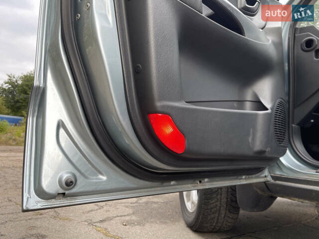 Синий Хендай Туксон, объемом двигателя 2.7 л и пробегом 220 тыс. км за 7900 $, фото 9 на Automoto.ua