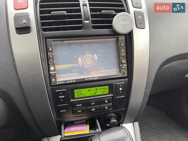 Синий Хендай Туксон, объемом двигателя 2.7 л и пробегом 220 тыс. км за 7900 $, фото 20 на Automoto.ua