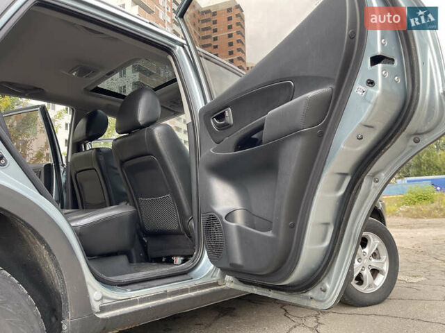 Синий Хендай Туксон, объемом двигателя 2.7 л и пробегом 220 тыс. км за 7900 $, фото 11 на Automoto.ua