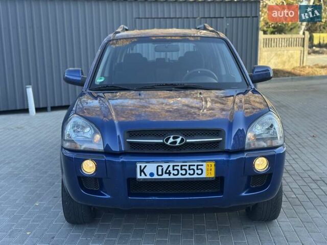 Синий Хендай Туксон, объемом двигателя 1.98 л и пробегом 178 тыс. км за 8700 $, фото 9 на Automoto.ua