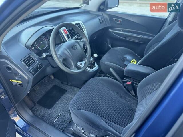 Синий Хендай Туксон, объемом двигателя 1.98 л и пробегом 178 тыс. км за 8700 $, фото 16 на Automoto.ua