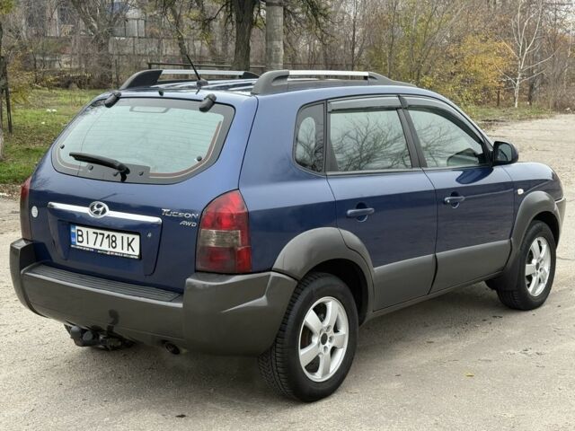 Синий Хендай Туксон, объемом двигателя 2 л и пробегом 279 тыс. км за 6280 $, фото 6 на Automoto.ua