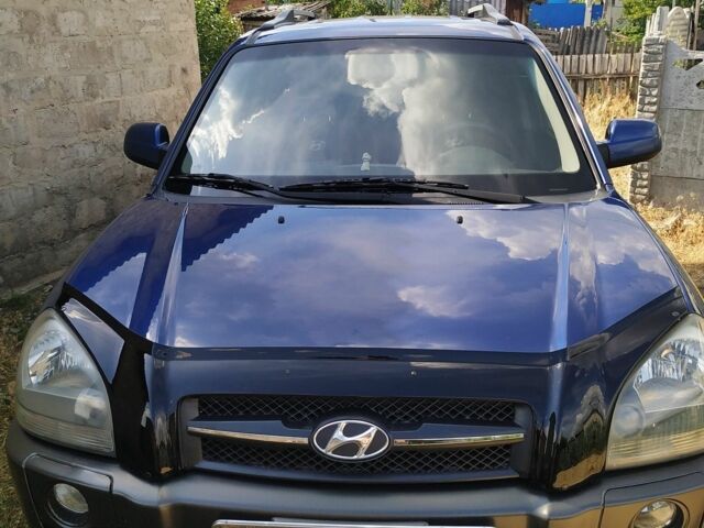 Синий Хендай Туксон, объемом двигателя 2 л и пробегом 200 тыс. км за 8000 $, фото 11 на Automoto.ua