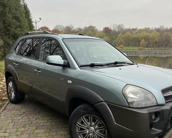 Синий Хендай Туксон, объемом двигателя 1.98 л и пробегом 168 тыс. км за 8500 $, фото 15 на Automoto.ua