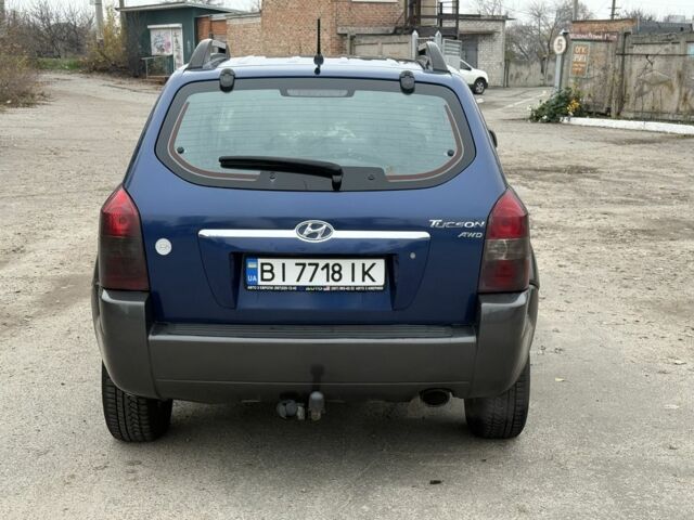 Синий Хендай Туксон, объемом двигателя 2 л и пробегом 279 тыс. км за 6280 $, фото 5 на Automoto.ua