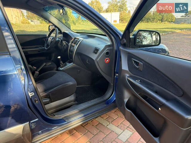 Синий Хендай Туксон, объемом двигателя 2 л и пробегом 168 тыс. км за 6900 $, фото 2 на Automoto.ua