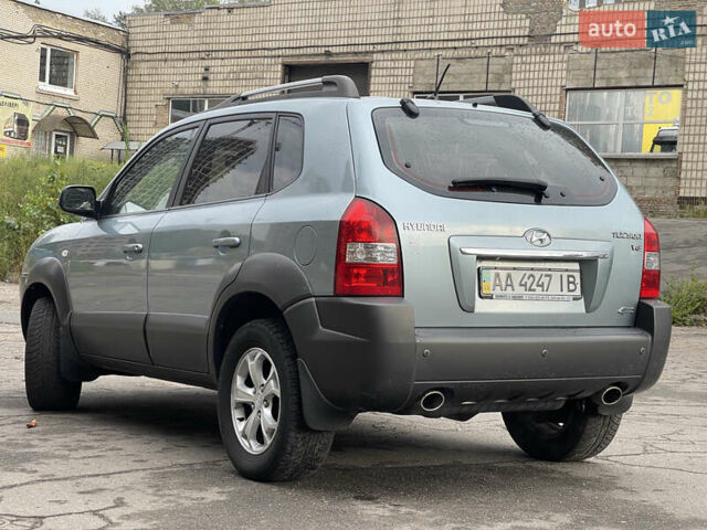 Синий Хендай Туксон, объемом двигателя 2.7 л и пробегом 220 тыс. км за 7900 $, фото 3 на Automoto.ua