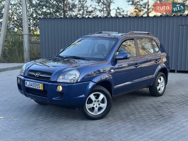 Синий Хендай Туксон, объемом двигателя 1.98 л и пробегом 178 тыс. км за 8700 $, фото 1 на Automoto.ua
