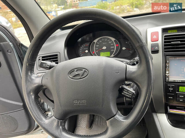 Синий Хендай Туксон, объемом двигателя 2.7 л и пробегом 220 тыс. км за 7900 $, фото 13 на Automoto.ua