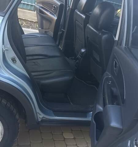 Синий Хендай Туксон, объемом двигателя 1.98 л и пробегом 183 тыс. км за 6700 $, фото 13 на Automoto.ua