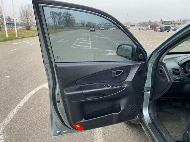 Синий Хендай Туксон, объемом двигателя 2 л и пробегом 179 тыс. км за 6500 $, фото 7 на Automoto.ua