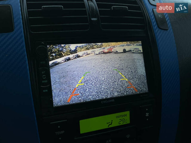Синий Хендай Туксон, объемом двигателя 2 л и пробегом 317 тыс. км за 9600 $, фото 26 на Automoto.ua