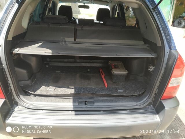 Синий Хендай Туксон, объемом двигателя 2 л и пробегом 200 тыс. км за 8000 $, фото 13 на Automoto.ua