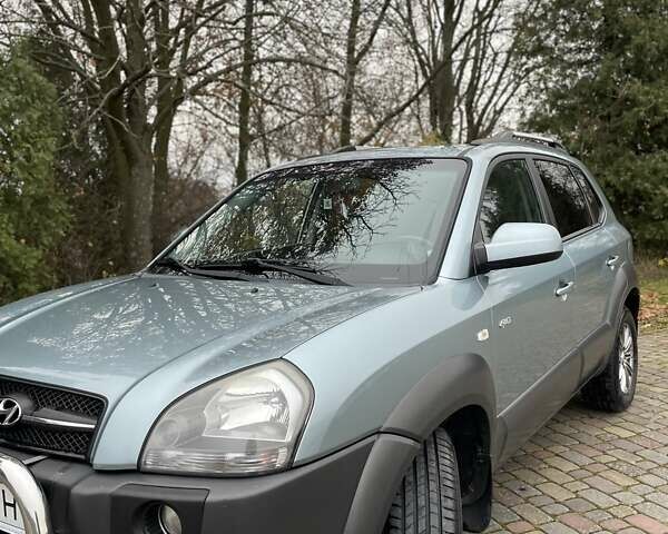 Синий Хендай Туксон, объемом двигателя 1.98 л и пробегом 168 тыс. км за 8500 $, фото 11 на Automoto.ua
