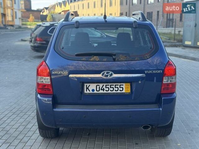Синий Хендай Туксон, объемом двигателя 1.98 л и пробегом 178 тыс. км за 8700 $, фото 15 на Automoto.ua
