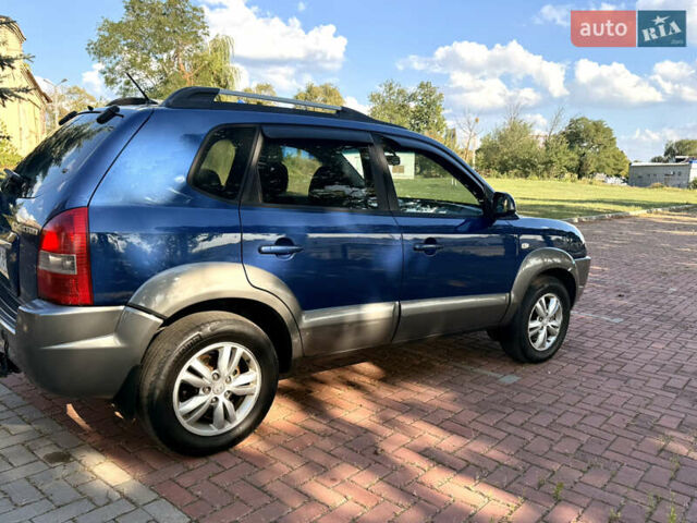 Синий Хендай Туксон, объемом двигателя 2 л и пробегом 168 тыс. км за 6900 $, фото 6 на Automoto.ua