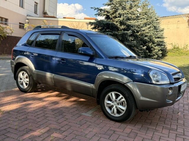 Синий Хендай Туксон, объемом двигателя 2 л и пробегом 168 тыс. км за 7500 $, фото 5 на Automoto.ua