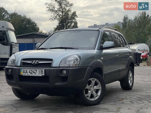 Синий Хендай Туксон, объемом двигателя 2.7 л и пробегом 220 тыс. км за 7900 $, фото 1 на Automoto.ua