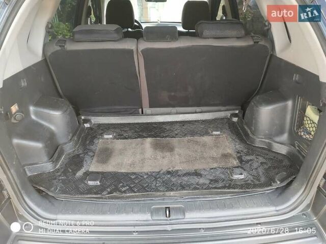 Синий Хендай Туксон, объемом двигателя 2 л и пробегом 200 тыс. км за 7600 $, фото 5 на Automoto.ua