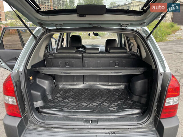 Синий Хендай Туксон, объемом двигателя 2.7 л и пробегом 220 тыс. км за 7900 $, фото 15 на Automoto.ua