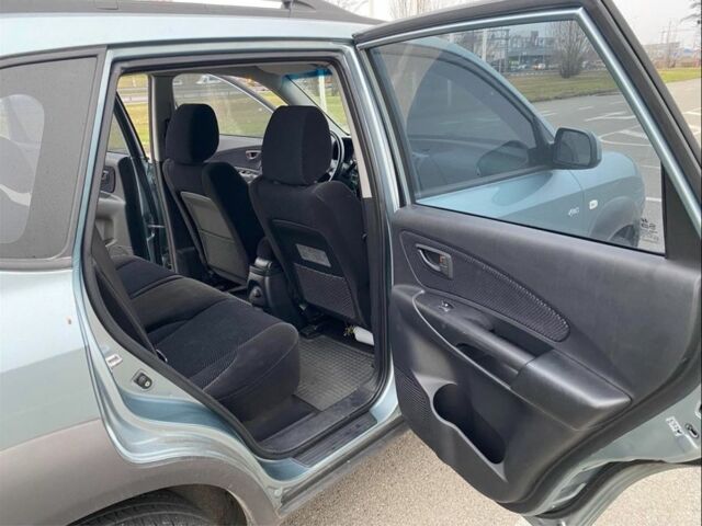 Синий Хендай Туксон, объемом двигателя 2 л и пробегом 179 тыс. км за 6500 $, фото 11 на Automoto.ua