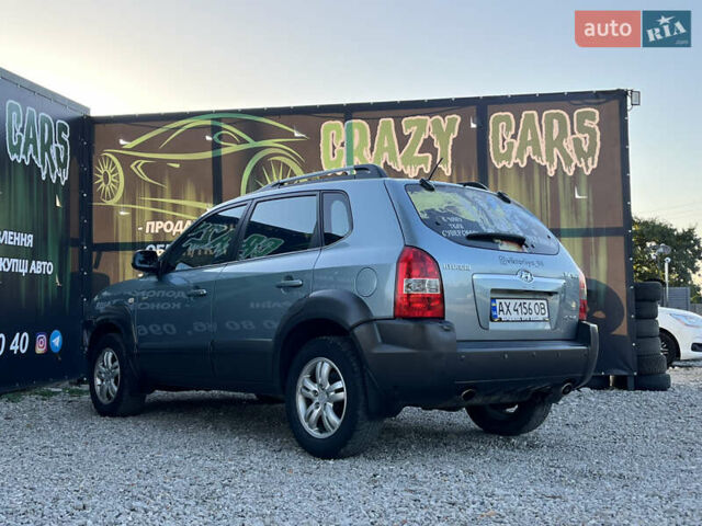 Синий Хендай Туксон, объемом двигателя 2 л и пробегом 317 тыс. км за 9600 $, фото 7 на Automoto.ua