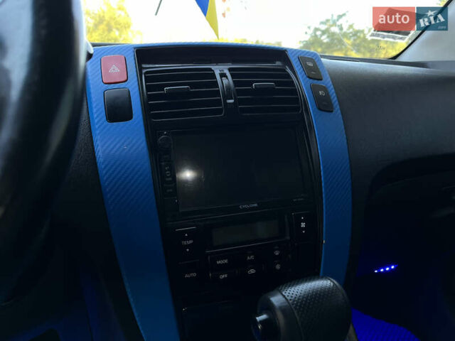 Синий Хендай Туксон, объемом двигателя 2 л и пробегом 317 тыс. км за 9600 $, фото 23 на Automoto.ua