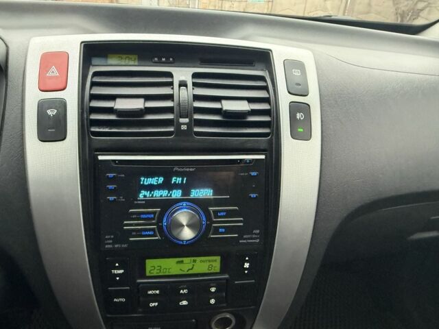 Синий Хендай Туксон, объемом двигателя 2 л и пробегом 279 тыс. км за 6280 $, фото 22 на Automoto.ua