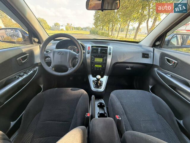 Синий Хендай Туксон, объемом двигателя 2 л и пробегом 168 тыс. км за 6900 $, фото 13 на Automoto.ua