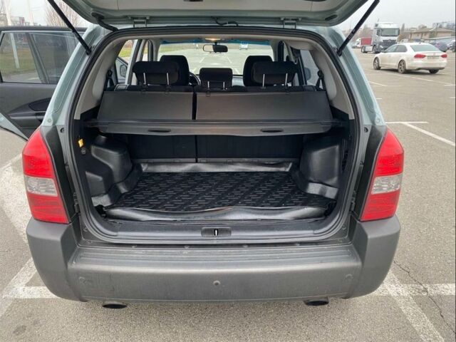 Синий Хендай Туксон, объемом двигателя 2 л и пробегом 179 тыс. км за 6500 $, фото 10 на Automoto.ua