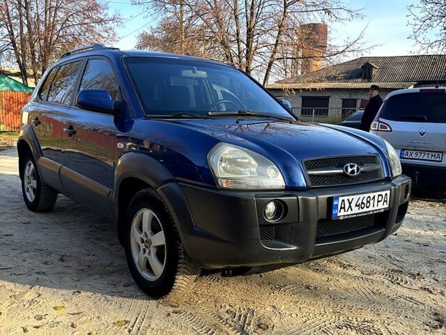 Синий Хендай Туксон, объемом двигателя 2 л и пробегом 208 тыс. км за 6700 $, фото 3 на Automoto.ua