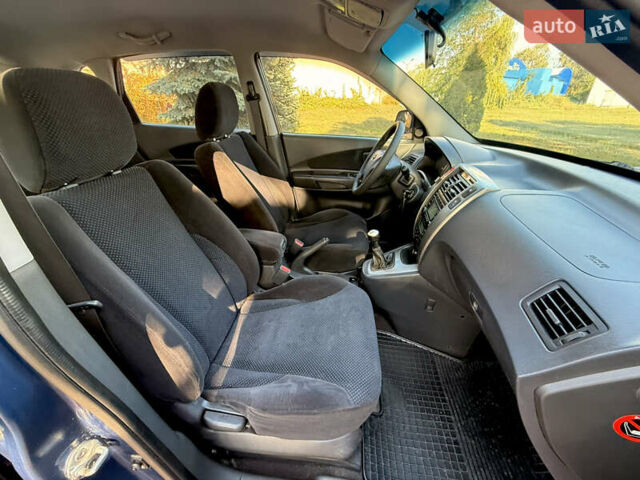 Синий Хендай Туксон, объемом двигателя 2 л и пробегом 168 тыс. км за 6900 $, фото 11 на Automoto.ua