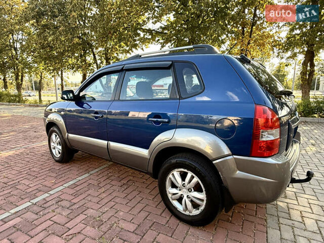 Синий Хендай Туксон, объемом двигателя 2 л и пробегом 168 тыс. км за 6900 $, фото 4 на Automoto.ua
