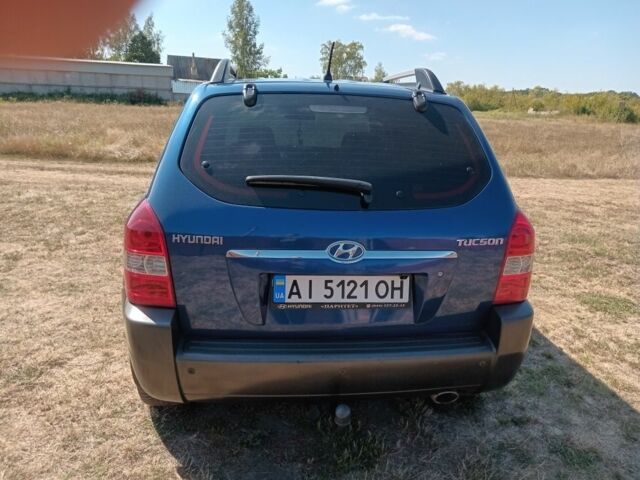 Синий Хендай Туксон, объемом двигателя 2 л и пробегом 240 тыс. км за 7700 $, фото 3 на Automoto.ua