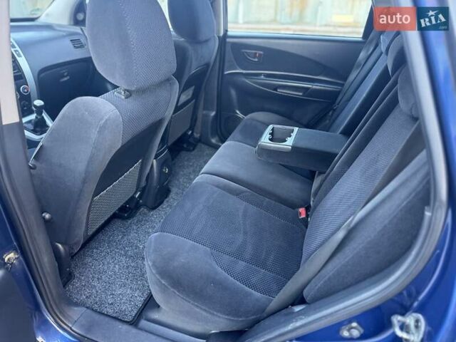 Синий Хендай Туксон, объемом двигателя 1.98 л и пробегом 178 тыс. км за 8700 $, фото 27 на Automoto.ua