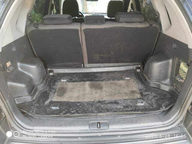 Синий Хендай Туксон, объемом двигателя 2 л и пробегом 200 тыс. км за 8000 $, фото 6 на Automoto.ua