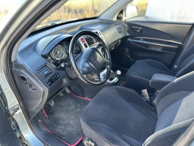 Синий Хендай Туксон, объемом двигателя 2 л и пробегом 187 тыс. км за 8200 $, фото 4 на Automoto.ua