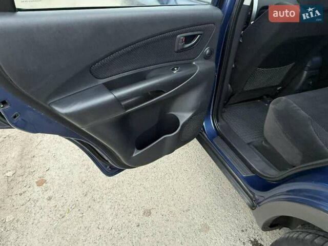 Синий Хендай Туксон, объемом двигателя 2 л и пробегом 270 тыс. км за 6250 $, фото 14 на Automoto.ua