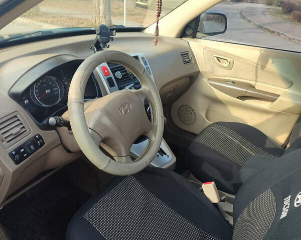 Синій Хендай Туксон, об'ємом двигуна 2 л та пробігом 147 тис. км за 9300 $, фото 20 на Automoto.ua