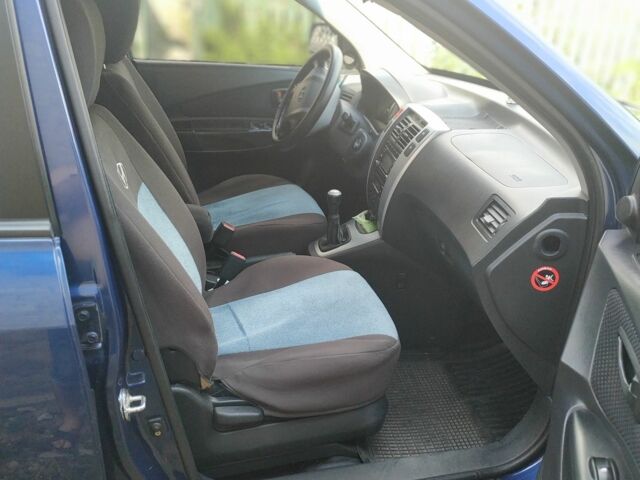 Синий Хендай Туксон, объемом двигателя 2 л и пробегом 200 тыс. км за 8000 $, фото 5 на Automoto.ua