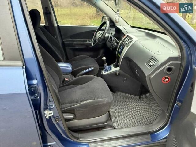 Синий Хендай Туксон, объемом двигателя 2 л и пробегом 270 тыс. км за 6250 $, фото 11 на Automoto.ua