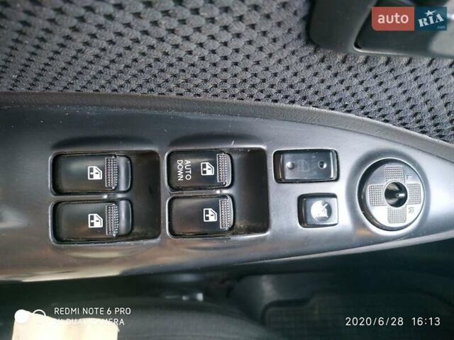 Синий Хендай Туксон, объемом двигателя 2 л и пробегом 200 тыс. км за 7600 $, фото 3 на Automoto.ua