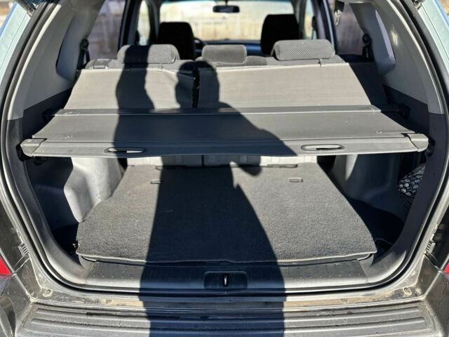 Синий Хендай Туксон, объемом двигателя 2 л и пробегом 187 тыс. км за 8200 $, фото 6 на Automoto.ua