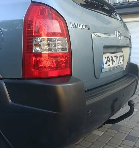 Синий Хендай Туксон, объемом двигателя 1.98 л и пробегом 183 тыс. км за 6700 $, фото 9 на Automoto.ua