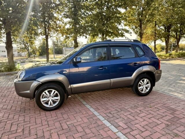 Синий Хендай Туксон, объемом двигателя 2 л и пробегом 168 тыс. км за 7500 $, фото 7 на Automoto.ua
